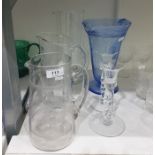 Blue bubble glass lemonade jug, conical and ribbed, on circular foot, three various glass jugs and a