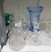 Blue bubble glass lemonade jug, conical and ribbed, on circular foot, three various glass jugs and a