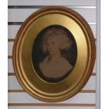 Pair of coloured prints, within oval gilt frames, showing late 18th century portraits of ladies,