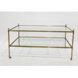 Gilt metal framed two-tier coffee table, rectangular, on circular column supports with slender