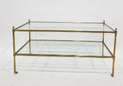 Gilt metal framed two-tier coffee table, rectangular, on circular column supports with slender