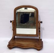 19th century mahogany dressing table mirror, the arched top mirror on a serpentine fronted base