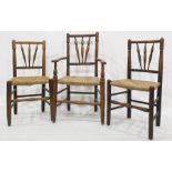 Set of seven (5+2) circa 1920's dining chairs, the three turned spindle back splaying outwards to