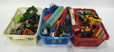 Three boxes of assorted toy vehicles to include Dinky Toys Thunderbird II model, various toy