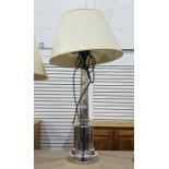 White metal - probably electro plate - table lamp with turned body and stepped circular base