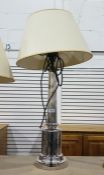 White metal - probably electro plate - table lamp with turned body and stepped circular base