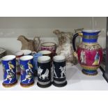 Two various pairs of cylindrical ceramic spill vases with classical figure decoration, a similar