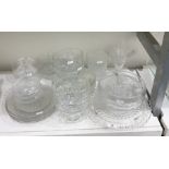 Set of four cut glass plates with star-cut bases, moulded glass cake plate, cut glass trumpet vase