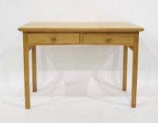 Modern oak two-drawer side table on square section supports, 113cm x 79cm