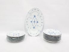 Quantity of porcelain dinner plates, fluted and decorated in Blue Denmark style and a matching