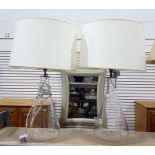 Pair of clear glass bodied table lamps, cream shades