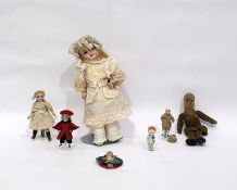 Porcelain headed doll on stand marked 'Made in Germany' together with various further (7)