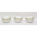 Set of twelve Raynaud Limoges white porcelain lobed dessert bowls, gilt bordered