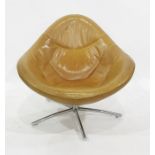 Heals Hidde leather swivel tub armchair of egg-shape design and on five pronged chrome base, 94cm