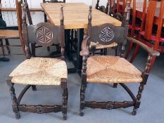 Set of six (4+2) 20th century oak framed dining chairs with rush seats, stretchered bases (6)