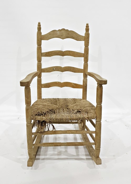 Beech framed ladderback rocking chair with turned stretchers