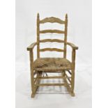 Beech framed ladderback rocking chair with turned stretchers