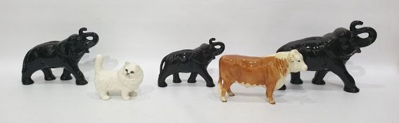 Beswick ceramic model of a bull, 15cm high, a Beswick model of a white-haired cat and three Sylvac