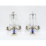 Pair gilt metal, blue glass and clear cut glass candelabrum lustres, each having pair foliate scroll