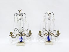 Pair gilt metal, blue glass and clear cut glass candelabrum lustres, each having pair foliate scroll