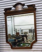 19th century mahogany and inlaid mirror with moulded pediment and bevel edge plate, the lower