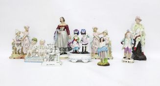 19th century continental porcelain figure of traveller, bisque and other figures including fairing