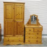 20th century pine wardrobe, a chest of drawers, a dressing table mirror and two headboards (5)