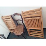 Four folding beech kitchen chairs and a rush seated chair (5)
