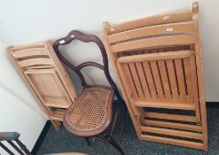 Four folding beech kitchen chairs and a rush seated chair (5)