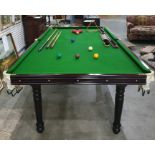 Snooker table with assorted balls, cues, triangle, scorer, etc