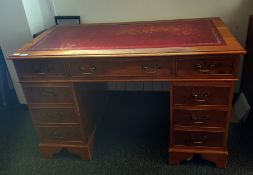 20th century yew pedestal desk with red leather inset top, nine drawers, on bracket feet