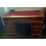 20th century yew pedestal desk with red leather inset top, nine drawers, on bracket feet