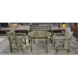 Garden furniture to include bench, two chairs and circular table