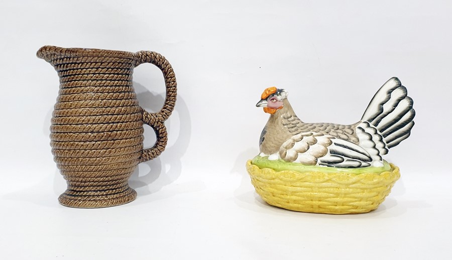 Pottery bowl and cover in the form of hen on basket, having yellow osier-pattern base, 16cm wide and