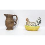 Pottery bowl and cover in the form of hen on basket, having yellow osier-pattern base, 16cm wide and