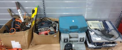 Collection of various power tools including bench tile cutter, drills, jigsaw, electric planer and