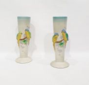 Pair of Clarice Cliff budgerigar applied tall pott