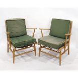 Two mid-20th century Ercol beech framed armchairs (2)Condition ReportOne of the chairs the webbing