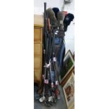 Golf caddy and assorted golf clubs