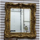 Rectangular wall mirror in moulded gilt frame