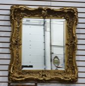 Rectangular wall mirror in moulded gilt frame