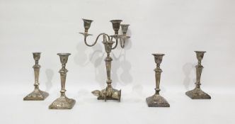 Four similar silver candlesticks of reeded design,