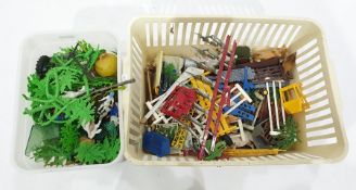 Two boxes of assorted plastic farmyard animals and toys