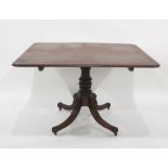 19th century mahogany tilt-top table, the rectangular top with rounded corners, moulded edge, turned