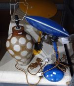 Mid twentieth century yellow and one blue lamps with flying saucer styling  and one further lamp
