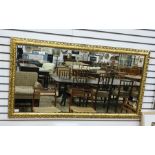 Rectangular mirror in a gilt moulded frame