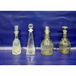 Two club-shaped cut glass decanters with triple-ri