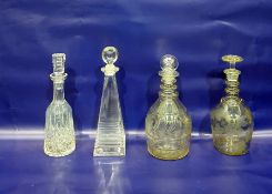 Two club-shaped cut glass decanters with triple-ri