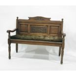 Oak bench with carved panel back, open arms, ring turned front legs Condition Reportimage as