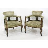 Pair of 19th century armchairs in striped upholstery, cabriole supports to castors (2)